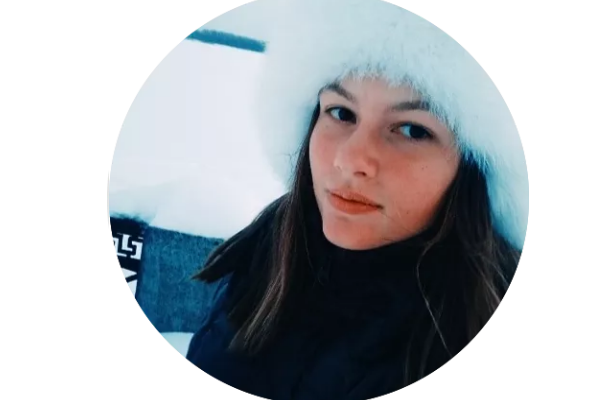 Photograph, circle, of Mariia Maksimova, World Table Hockey Association, Russia, wearing Russian fur hat.